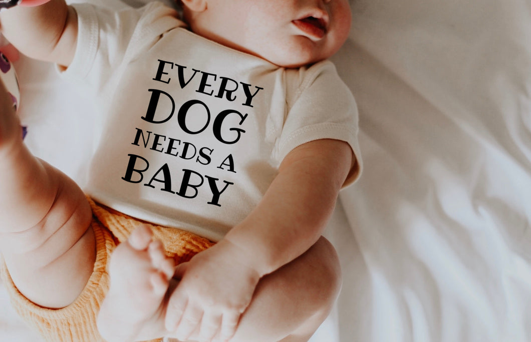Every Dog Needs A Baby Bodysuit