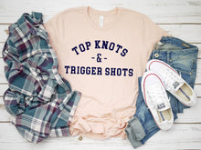 Load image into Gallery viewer, Top Knots &amp; Trigger Shots Tee
